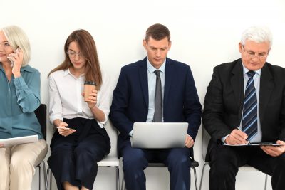 Older adult waiting for job interview