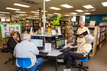 Harvey Schoenman with students at Community Library in Castle Shannon