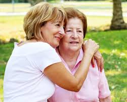 Mother and daughter hugging