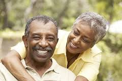 Mature couple in yellow shirts