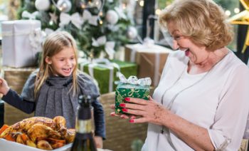 Child Giving Gift to her Grandmother