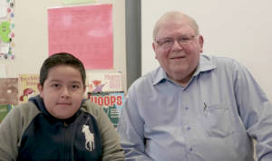 Simon tutoring a child