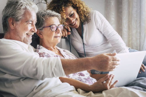 Image of older adults using technology