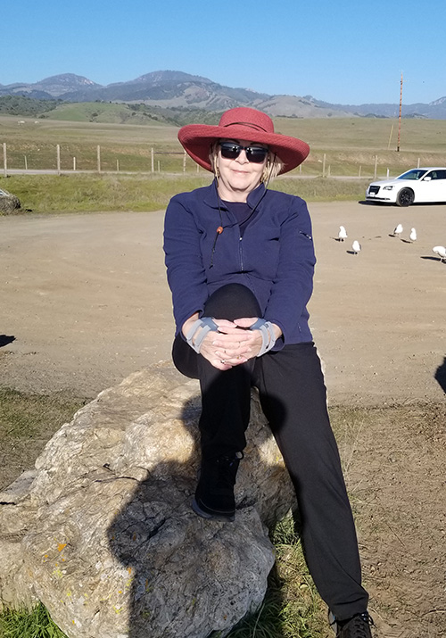 Linda with mountains in the background Linda with mountains in the background