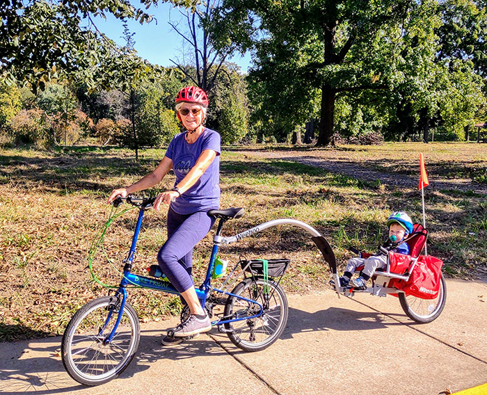 Janice Branham Janice Branham, above with her youngest biking buddy, retired in 2018 from her job as director of communications and technology at the Oasis Institute.